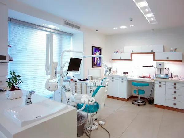 A bright, modern dental surgery with a treatment chair